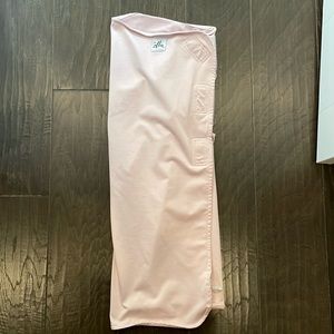 The Ollie swaddle- light pink. Used- like new